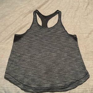 Size 8 (no tags but I always get size 8) lululemon tank top.
